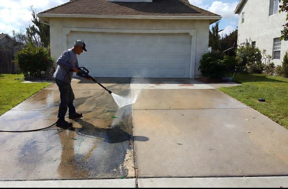 Pressure washing a home exterior in Mobile, Alabama